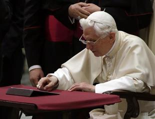 Pope blesses his Internet followers in first tweet