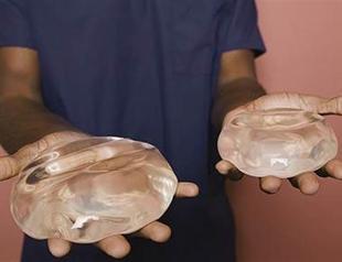 Spain arrests woman with cocaine breast implants