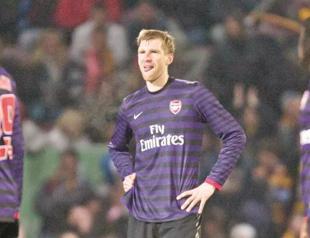 Wenger refuses to slam team despite shock loss