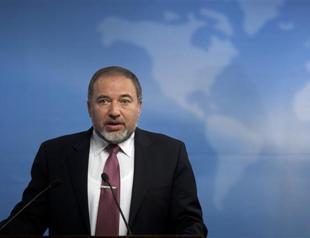 Israeli FM charged with breach of trust