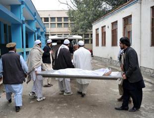 Taliban bomb hits US firm, mine kills 10 Afghan girls