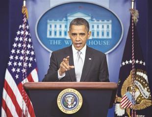 Obama vows anti-gun action in US