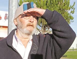 Implant boss free, court pends trial