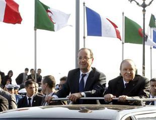 Hollande faces France’s bitter colonial past in Algeria
