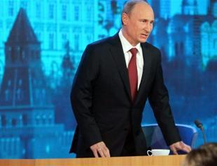 Russias Putin denies propping up Assad