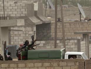 Syria bombards rebel area near Turkish border