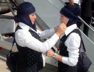 EgyptAir stewardesses begin wearing hijab