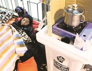 Bank halts evictions after second suicide