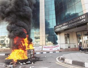 Unpaid salaries spark outrage in Nicosia