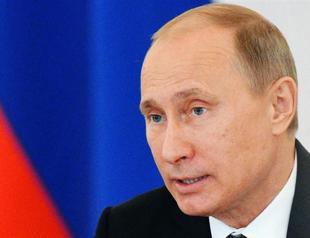 Putin signs anti-US adoption law: Kremlin