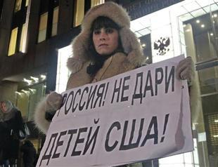 US deeply regrets signing of Russia adoption law