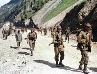 Pakistani and Indian troops exchange fire in Kashmir