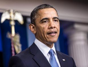 Obama signs fiscal cliff bill into law