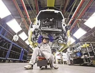 Peugeot blames eurozone crisis for sale drop