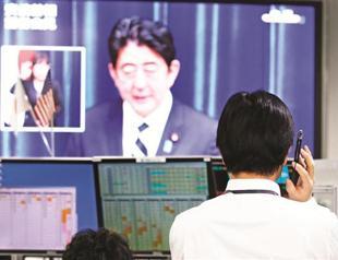 Japan approves $224 bln stimulus