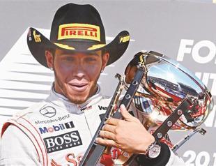 Formula title race goes to the wire as Hamilton wins