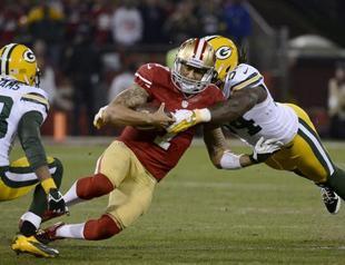 Ravens shock Broncos, 49ers oust Packers