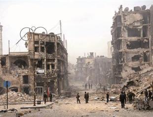 Syria jets hit Damascus and Turkey border town