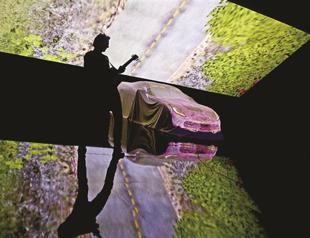 Car fair signals recovery, Toyota regains top seat