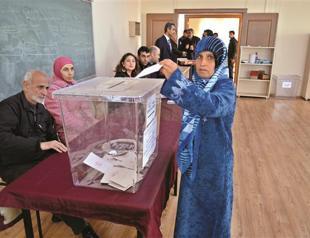 Border clashes rage as Syrians heads to ballot