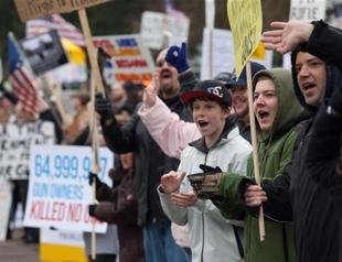 US gun supporters rally as five more hurt in shootings