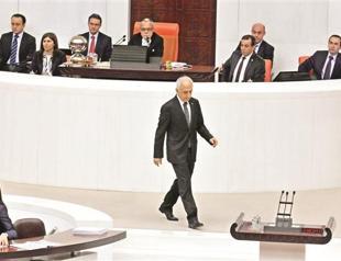 Ombudsman takes oath amid protests