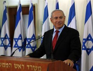 Israel vows Syria strike at any sign of chemical arms transfer