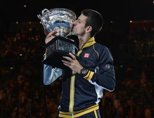 Supreme Djokovic grinds down Murray for three-peat