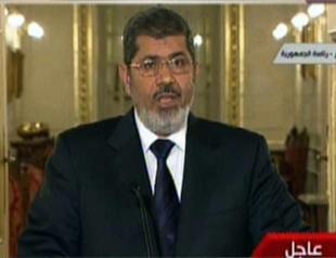 Cabinet approves draft law allowing Morsi to deploy army