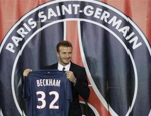 Beckham signs for PSG, donates salary to charity
