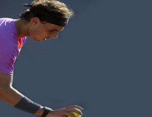 Nadal triumphs in singles return