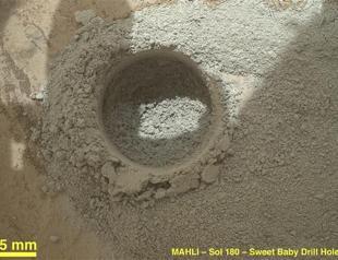 In milestone, Mars rover collects first bedrock sample