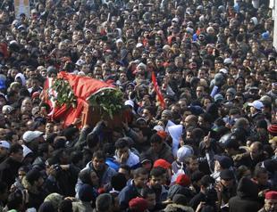 Tunisia says one policeman dead, 375 arrests in unrest