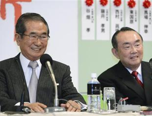 Conservatives win Japan poll: broadcasters