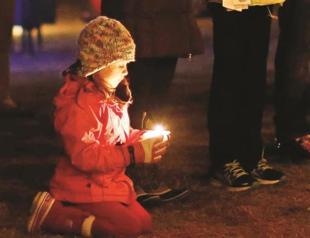 US grieves amid reports of other shooting plots