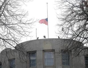 U.S. embassy flag at half mast
