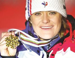 French Rolland wins downhill title