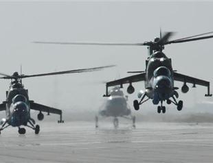 NATO accused of killing 10 Afghan civilians in air strike