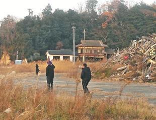 Japan continues massive cleanup