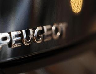 Peugeot unveils historic 5 billion euro loss for 2012