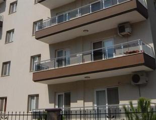 65 year old accused of pushing 23 year old wife off balcony