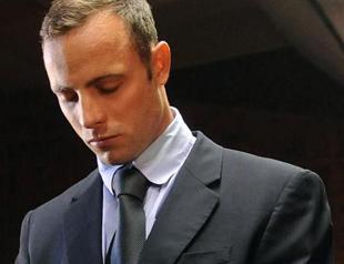 Pistorius not required to report to police: court