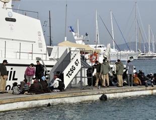 Dozens escape drowning after refugee boats capsize in Aegean Sea