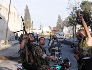 Syria rebels down chopper as regime raids towns: NGO