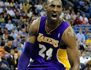Kobe reaches milestone in win
