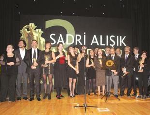 Theater artists on stage to take awards