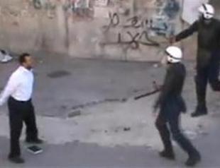 Video showing protester standing against police stuns Bahrain