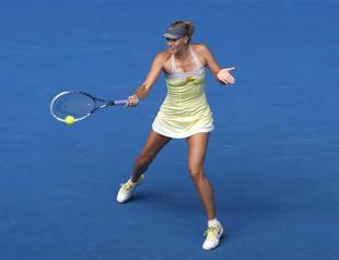 Sharapova serves more bagels as Stosur chokes