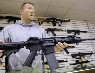 Obama unveils gun plan, concedes tough fight ahead