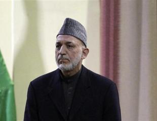 Afghan president condemns NATO killing of two boys